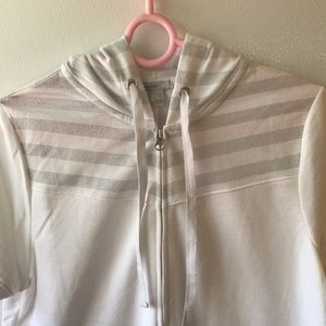 Short sleeve zip top with hood.